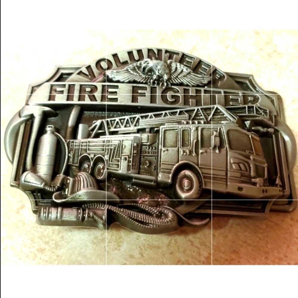 New volunteer firefighter belt buckle fits 1.5 belt.